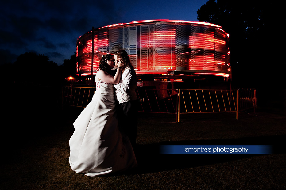 wedding couple with fair ride at new forest wedding reception