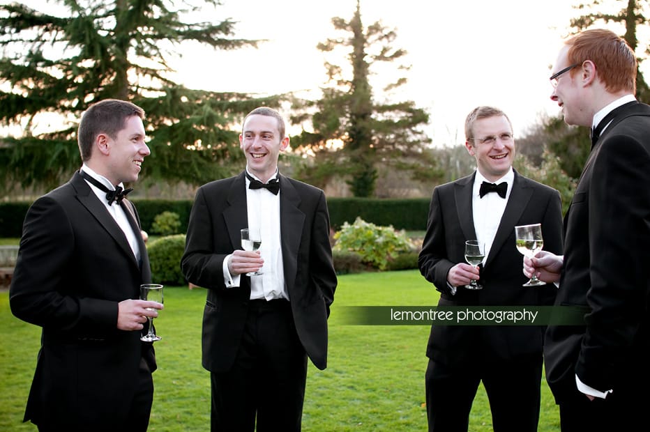 Ushers before wedding in the garden at Gerbestone manor Romsey Wedding Photograpy