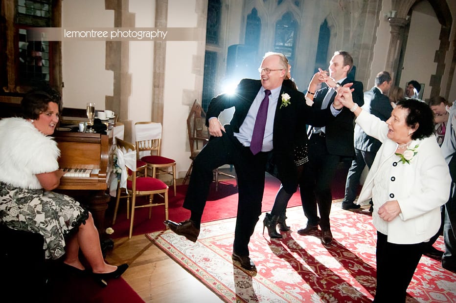 parents getting their groove on at wedding reception