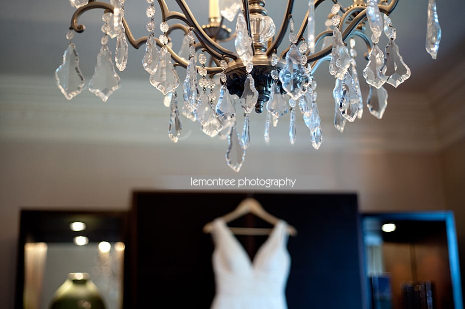 Wedding dress at Rhinefield House Hotel brides wedding dress hung up in hotel room