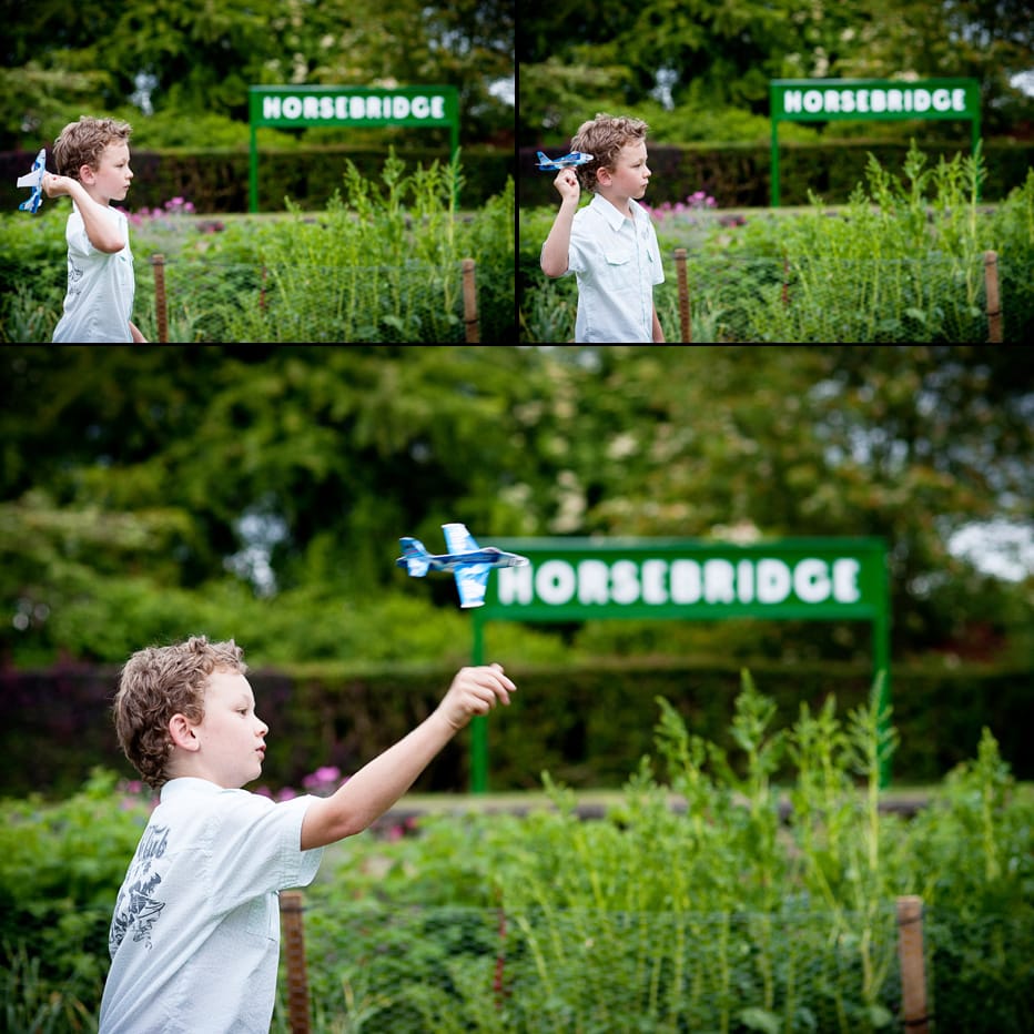 Horsebridge Station boy with paper aeroplane at wedding