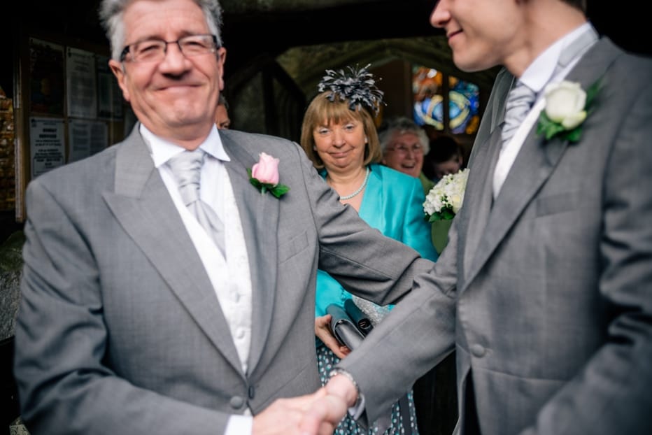 father and son at wedding