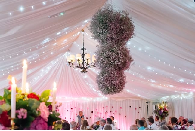 hanging flower display at wedding