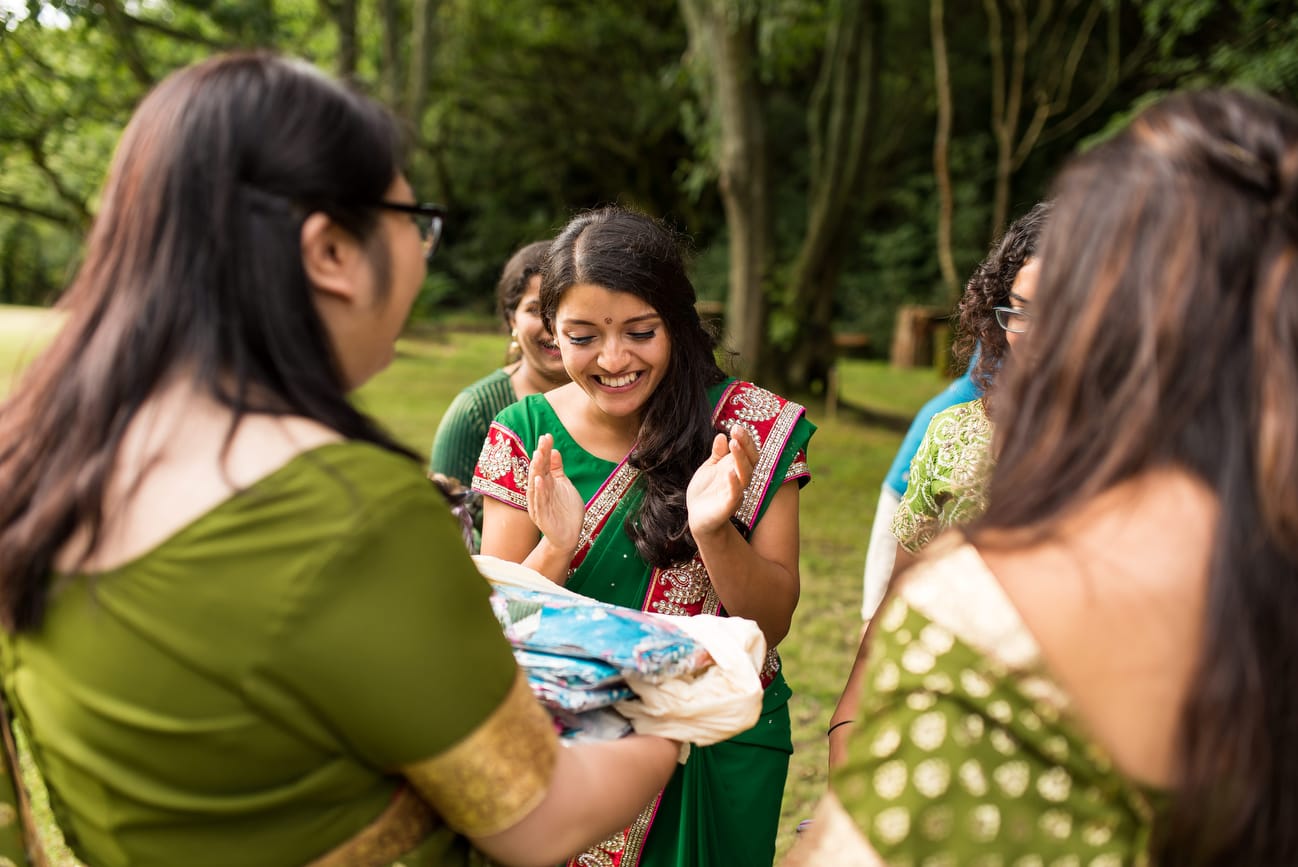 bridesmaids with gifts for bride