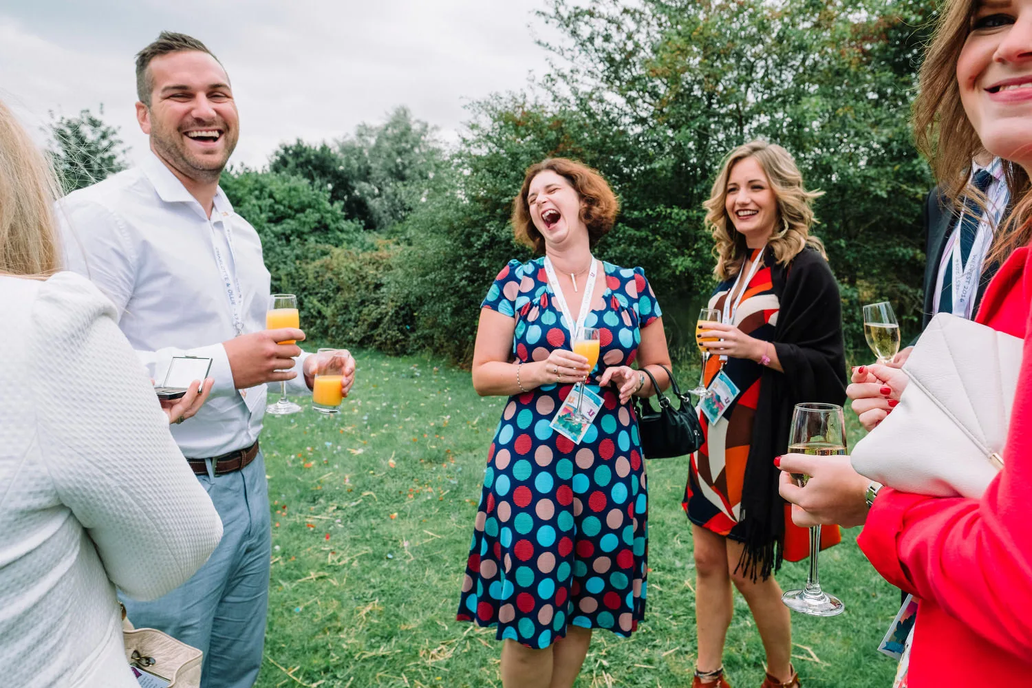 wedding guests laughing