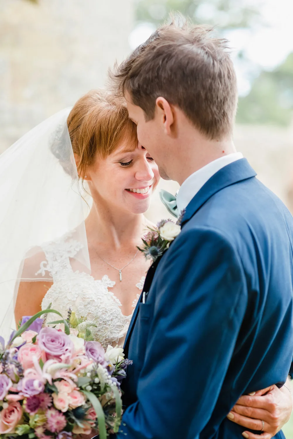 bride and groom laughing