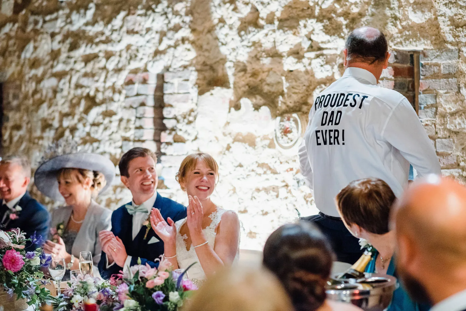 bride laughing during speeches