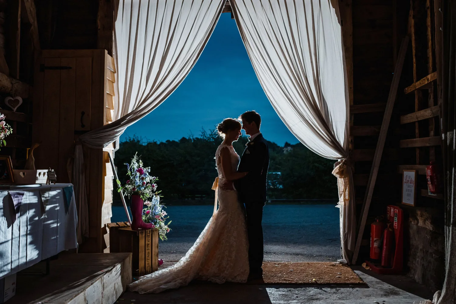 bride and groom photographed at nigh