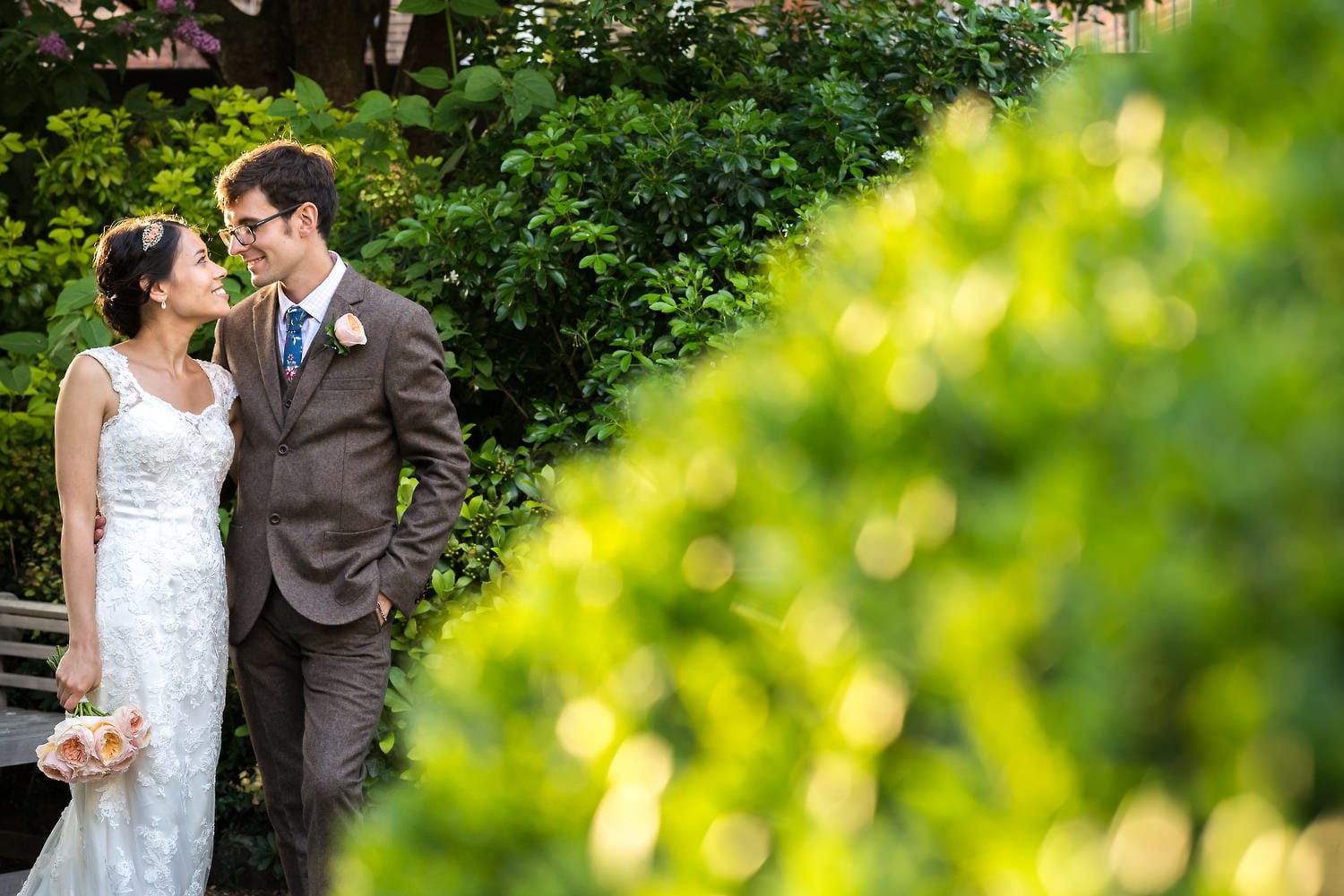 bride and groom in walled garden scaplen's court