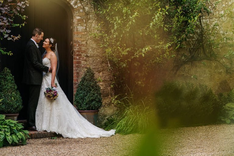 bride and groom outside ramster hall
