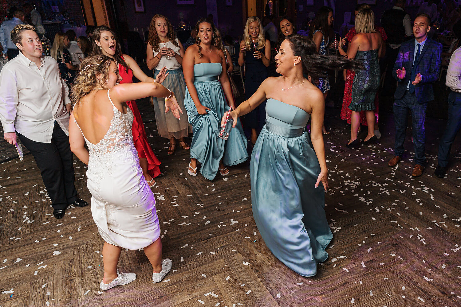 bride dancing with bridesmaid