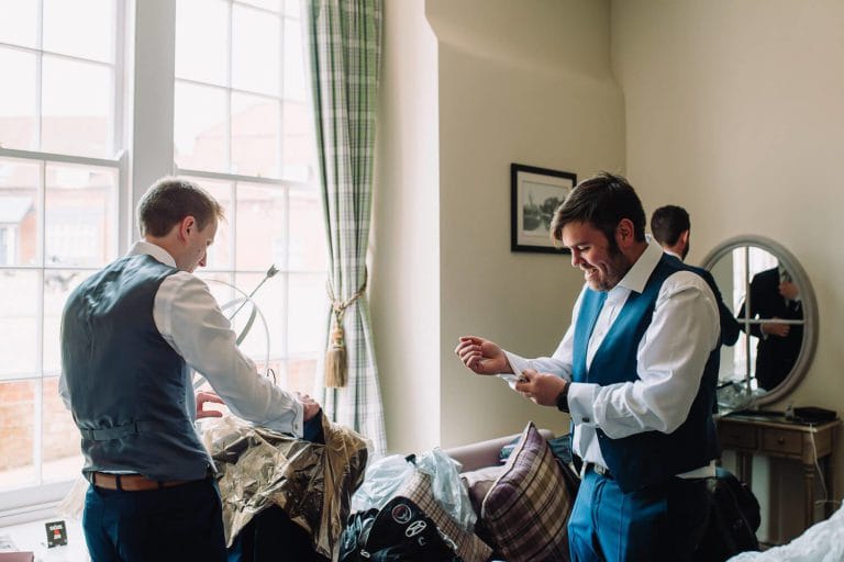 groom getting ready at froyle park