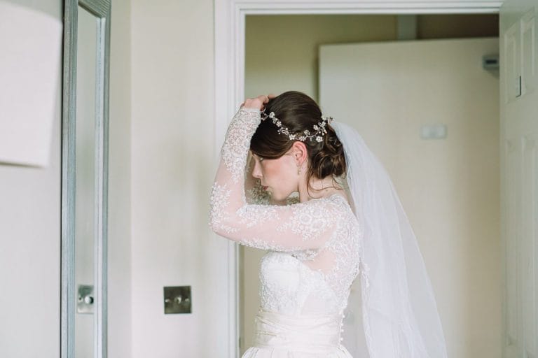 bride getting ready at froyle park in hampshire