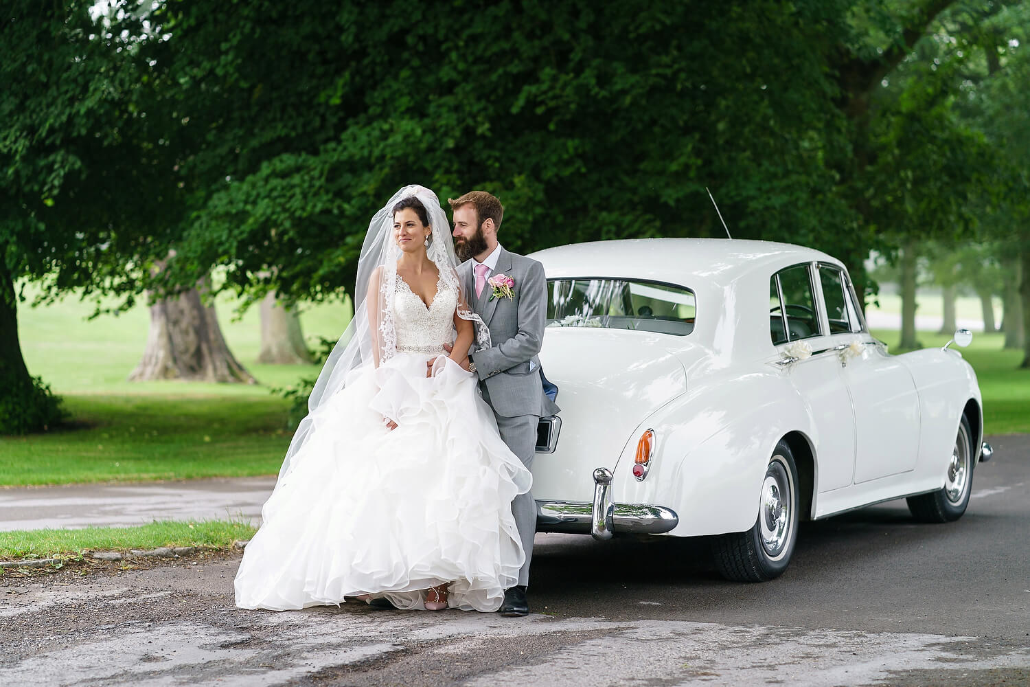 bride and groom at lulworth castle